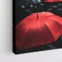Κόκκινες ομπρέλες ανάμεσα σε μαύρη ομοιομορφία